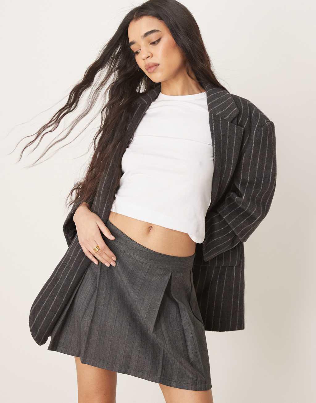 ASOS DESIGN pleated mini skirt in gray herringbone Product Image