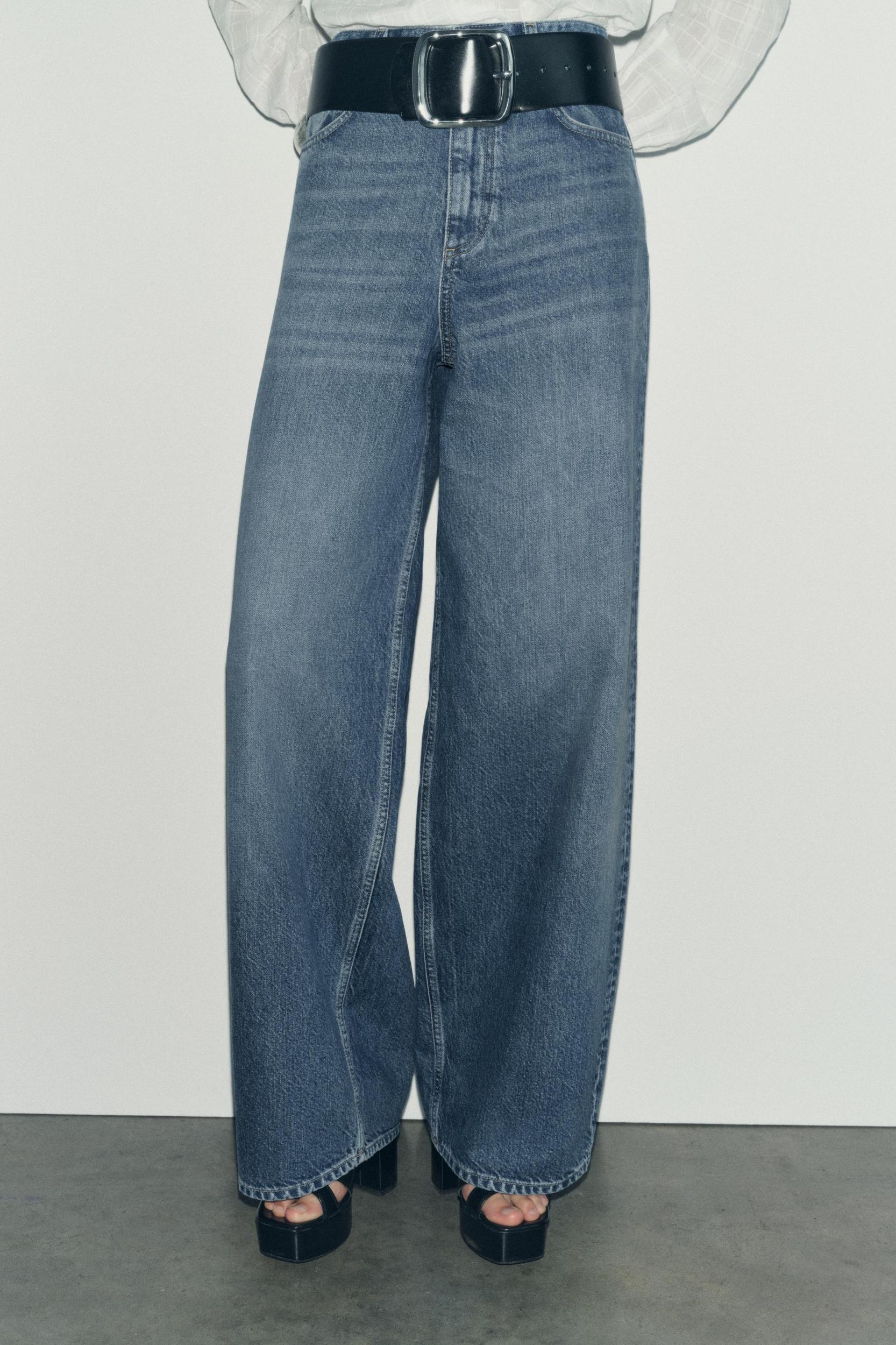 ZARA WOMAN COLLECTION<br/><br/>Blouse made with cotton. Round neck and long sleeves. Self ruffle detail. Front button closure. Product Image