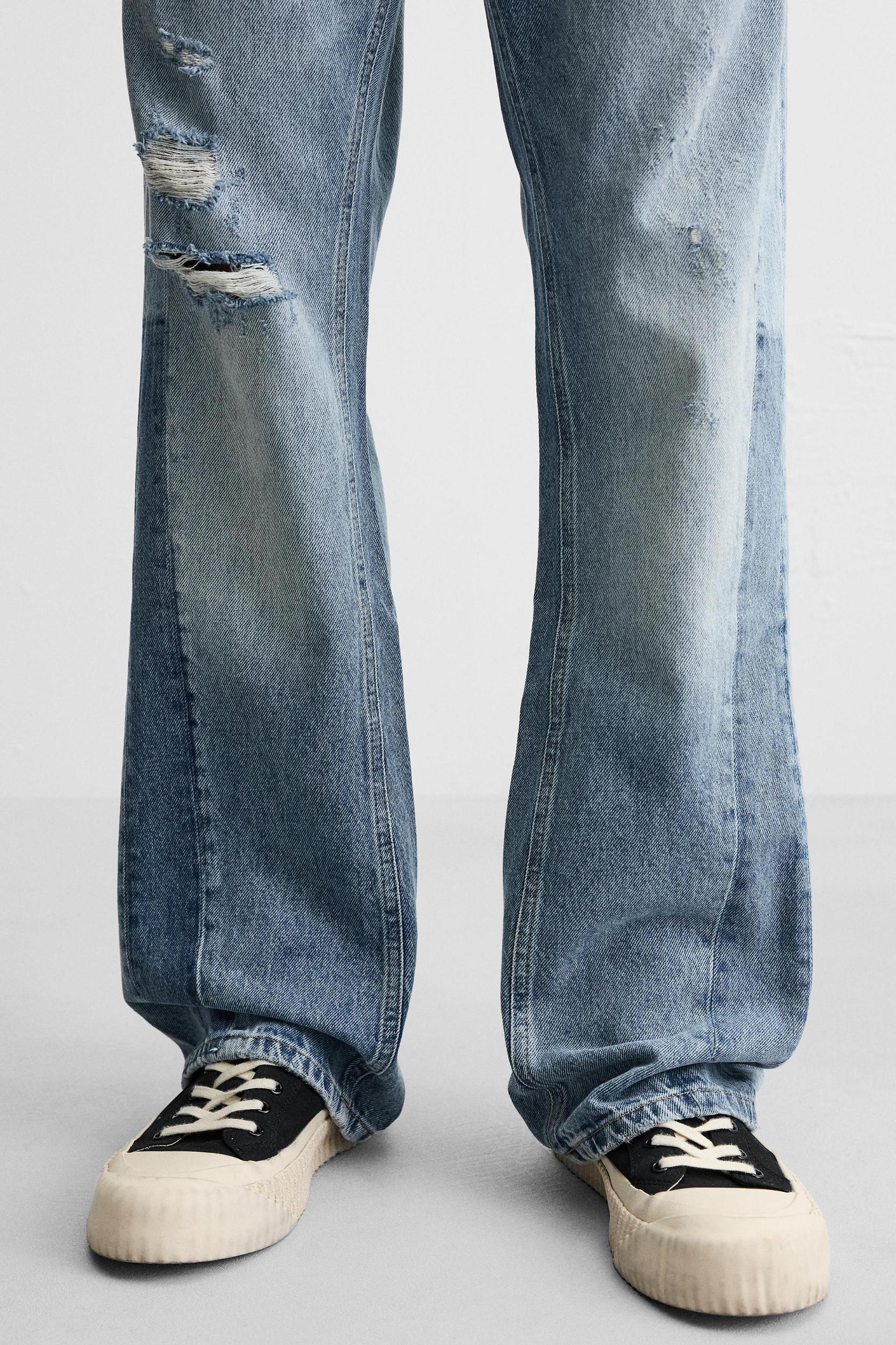 RIPPED FLARE FIT JEANS Product Image