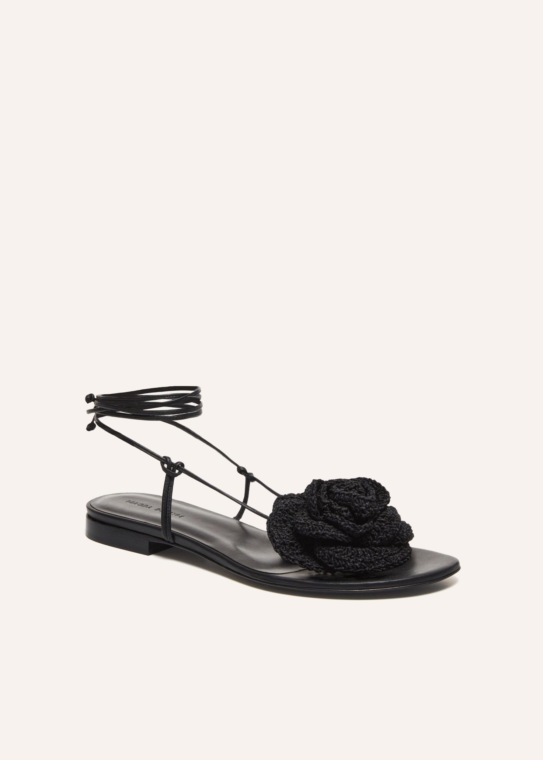 Wrap around flat flower sandals in black crochet Product Image