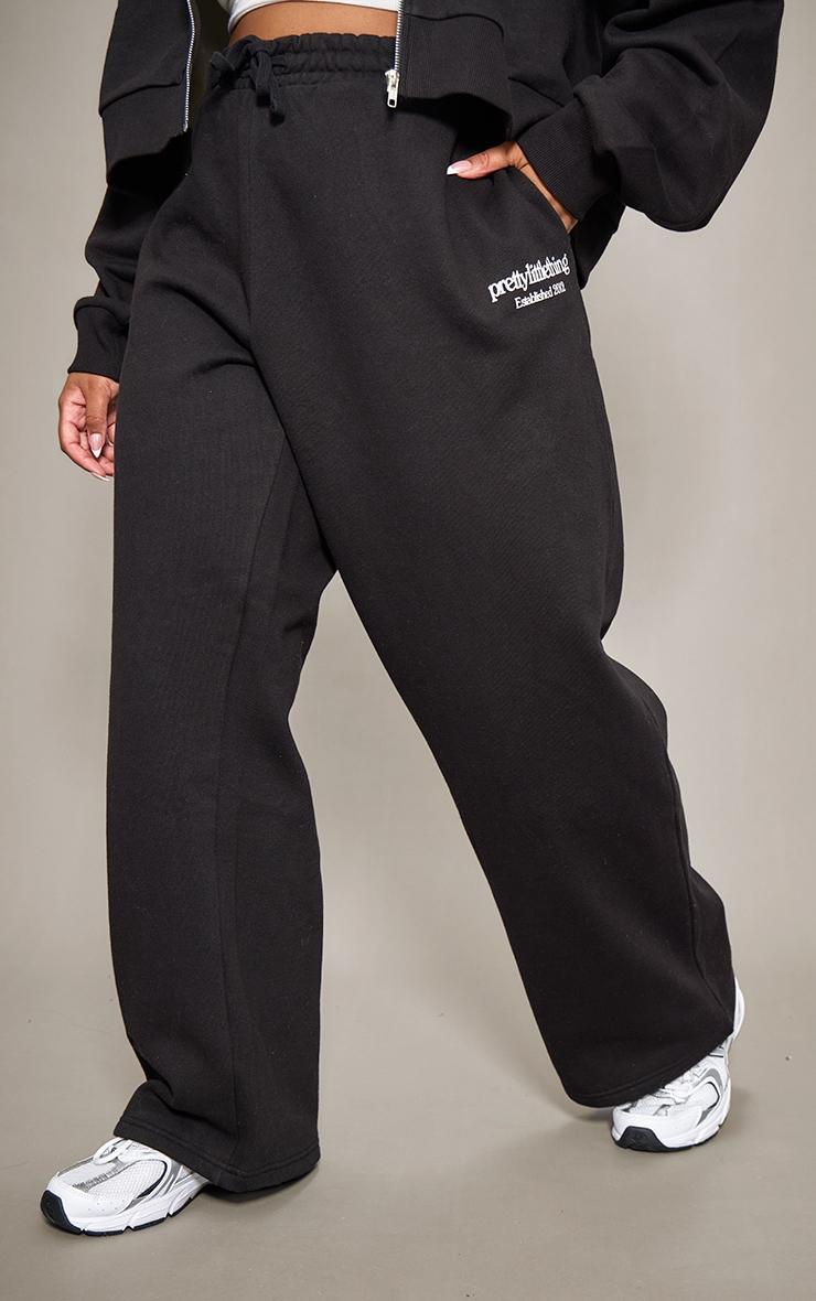 PRETTYLITTLETHING Plus Black Printed Premium Wide Leg Sweatpants Product Image