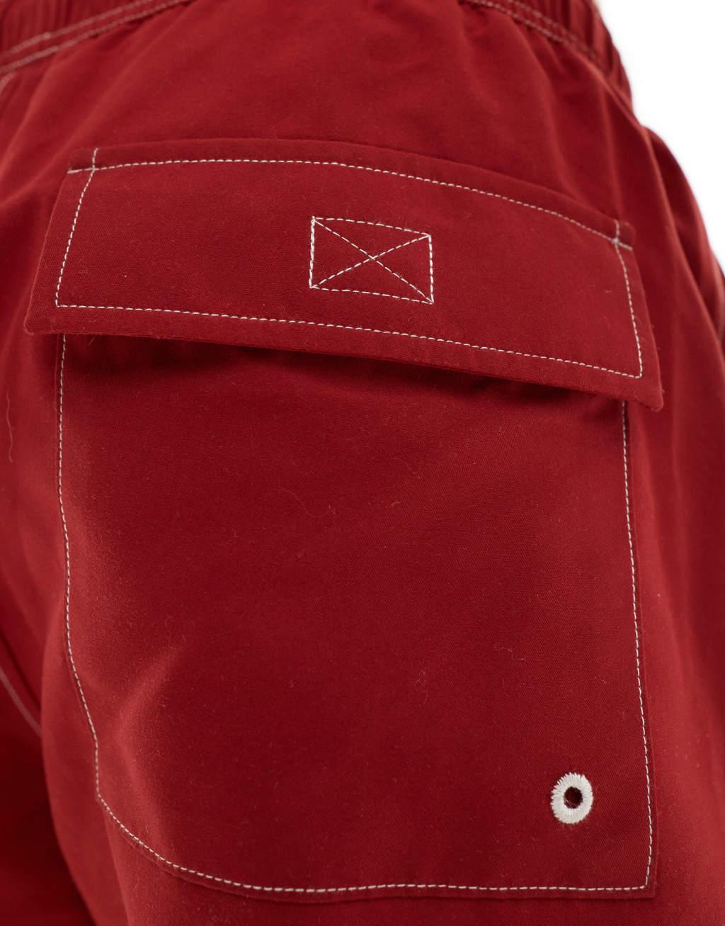 ASOS DESIGN swim shorts in short length with contrast stitch detail in burgundy Product Image