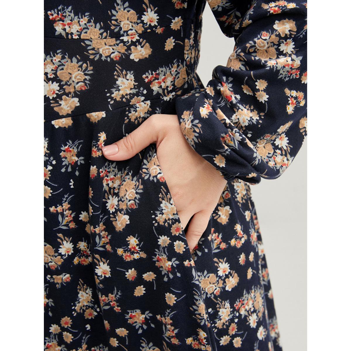 Plus Size Ditsy Floral Pocket Lantern Sleeve Shirred Flutter Dress Indigo Women Elegant Elastic Waist V-neck Long Sleeve Curvy Midi Dress BloomChic 12/L Product Image