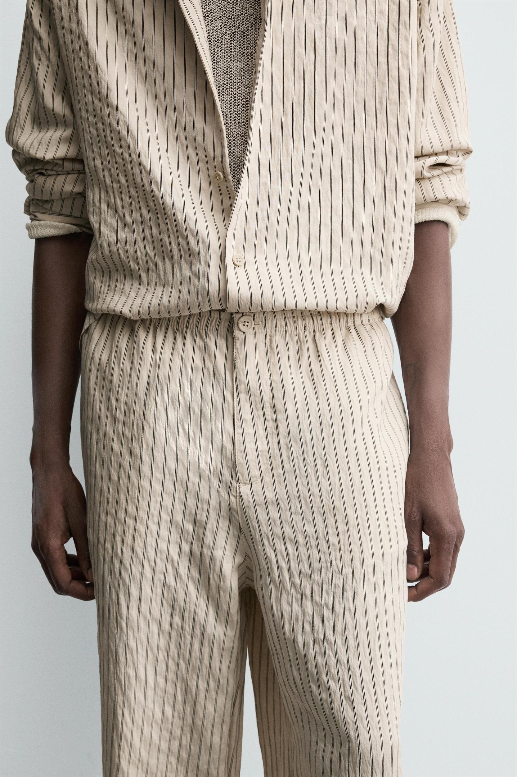 WRINKLED EFFECT STRIPED FLOWY PANTS Product Image