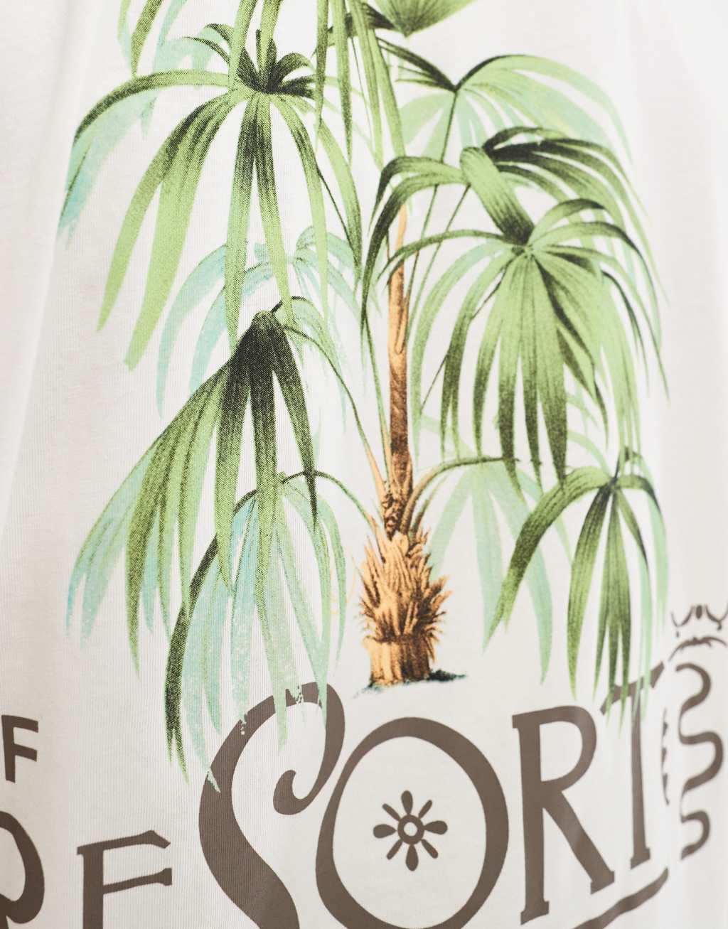 ASOS DESIGN oversized t-shirt in off white with palm resort back print Product Image
