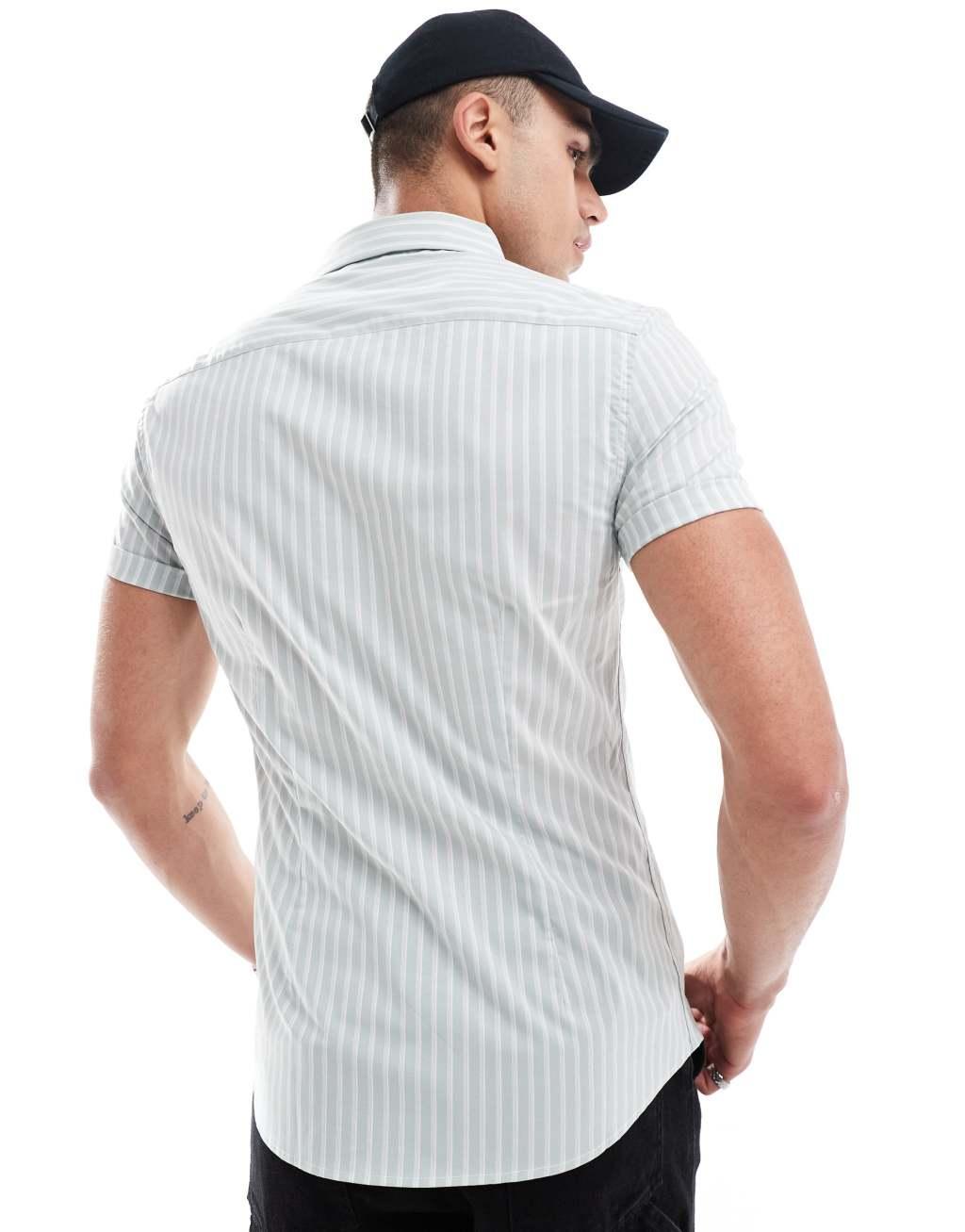 ASOS DESIGN skinny fit stripe work shirt with roll sleeves in light green Product Image