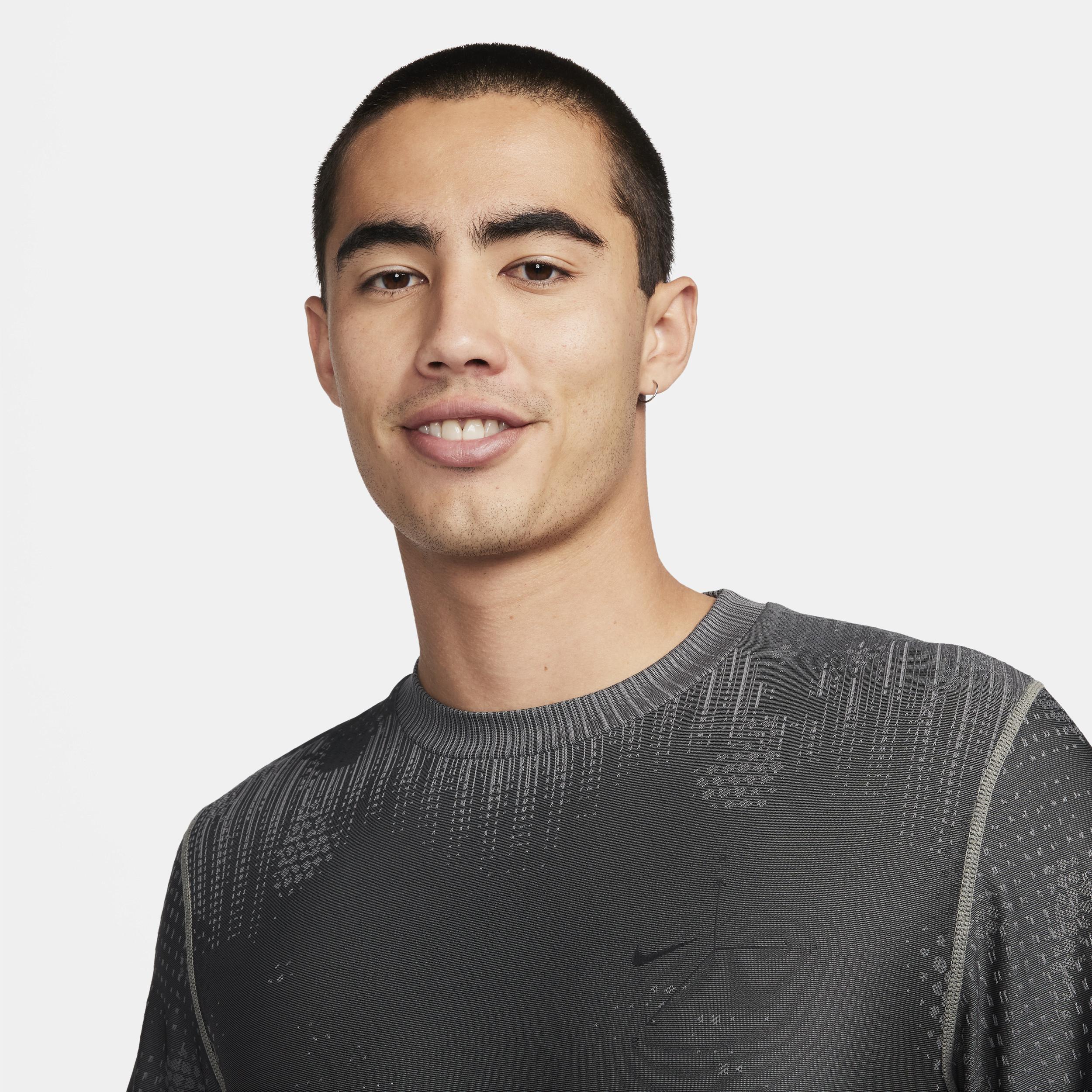 Nike A.P.S. Men's Dri-FIT ADV Short-Sleeve Versatile Top Product Image