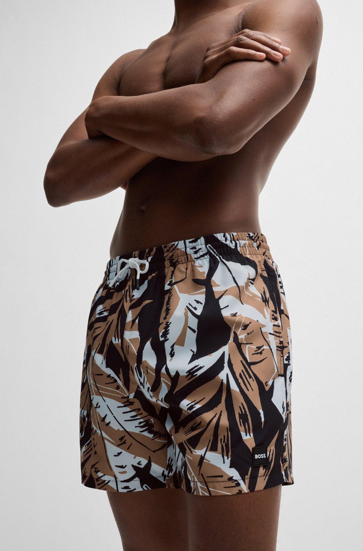 Fully lined swim shorts with seasonal print Product Image