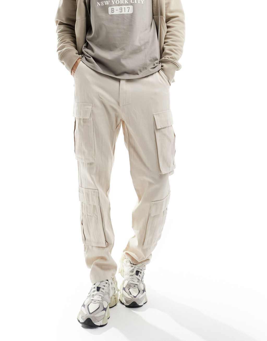 Sixth June multi tactical cargo pants in beige Product Image