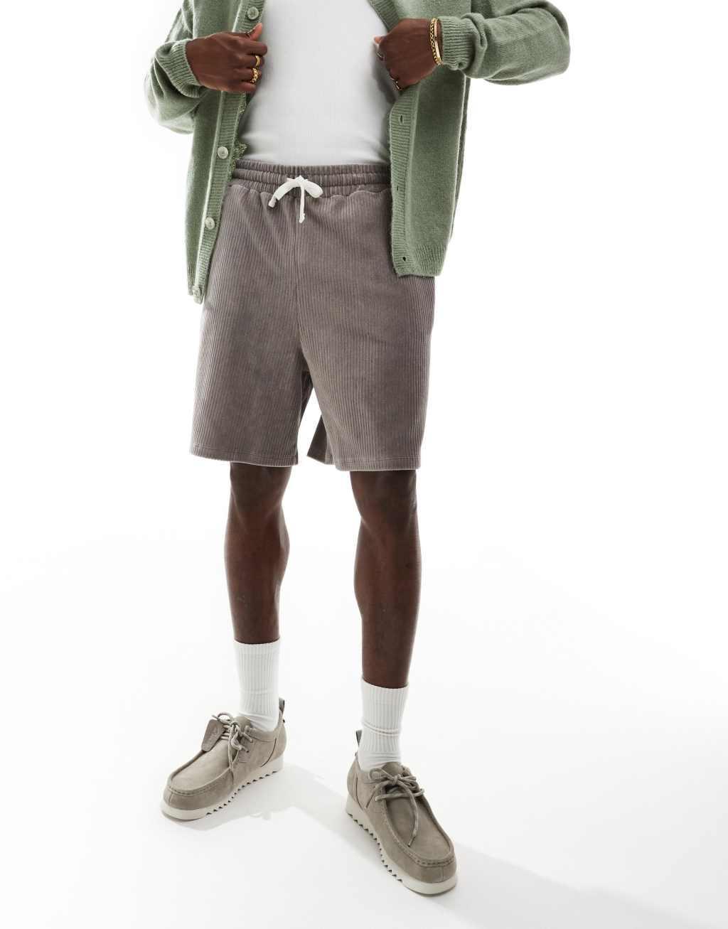 ASOS DESIGN oversized ribbed velour shorts in light brown Product Image