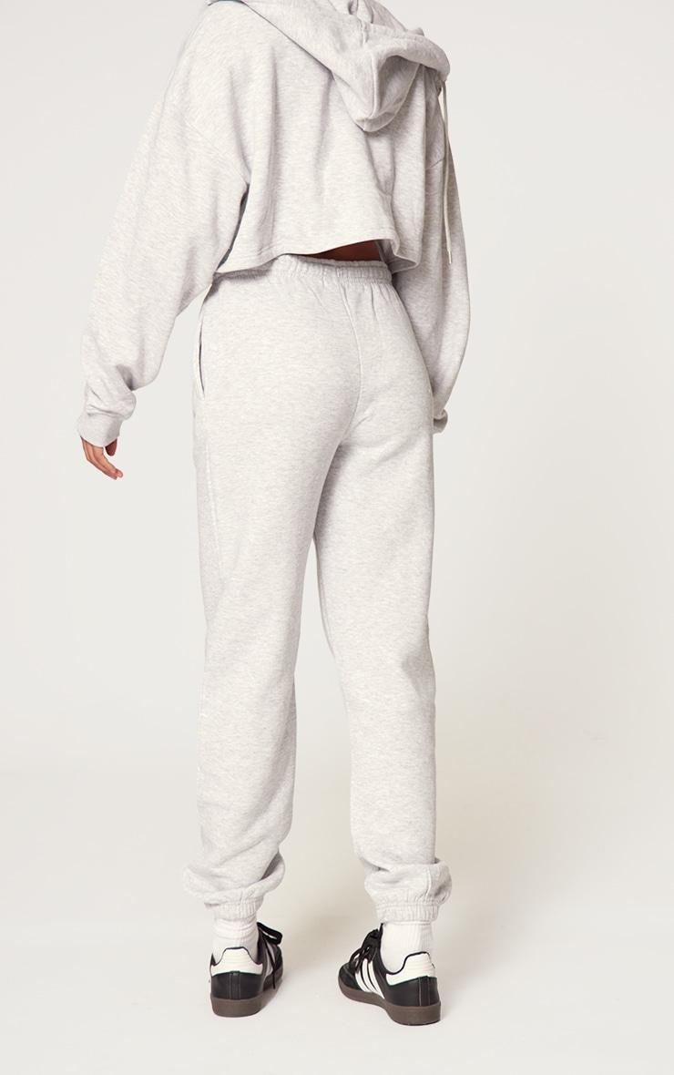 PRETTYLITTLETHING Grey Marl Copy right Graphic Sweatpants Product Image