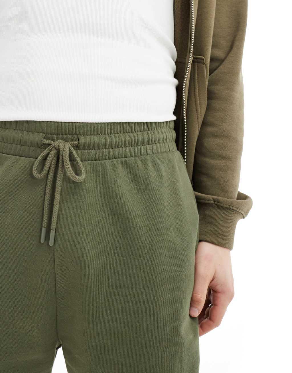 ASOS DESIGN slim fit shorts in olive Product Image
