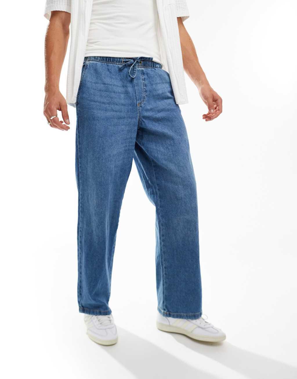 Jack & Jones Eddie loose drawstring jeans in mid blue wash Product Image