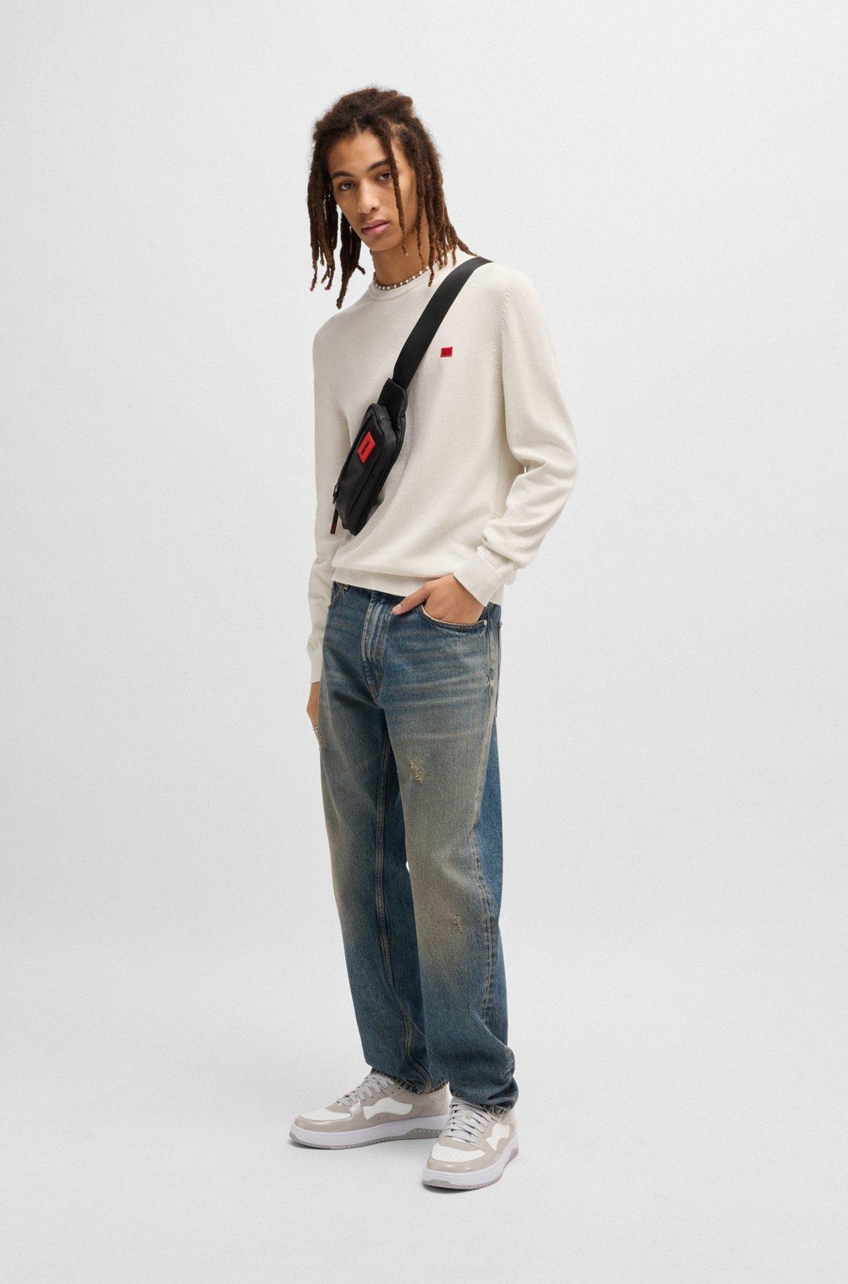 Knitted cotton sweater with red logo label Product Image