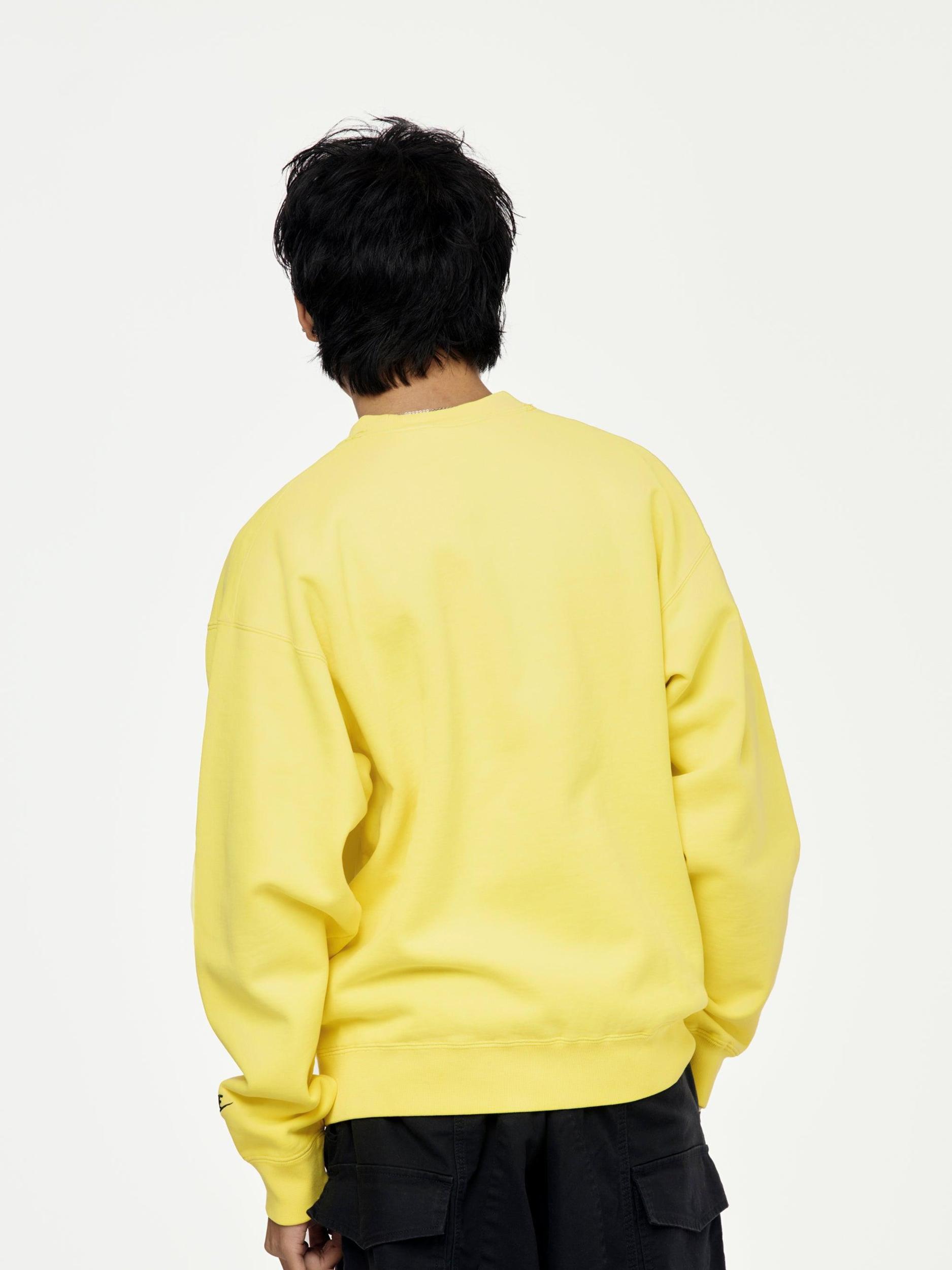 M NRG NIGO CREW FLC (SPEED YELLOW/BLACK) Product Image
