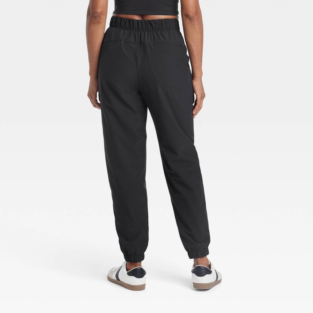 Womens High-Rise Winter Woven Lined Joggers - All In Motion Black Product Image