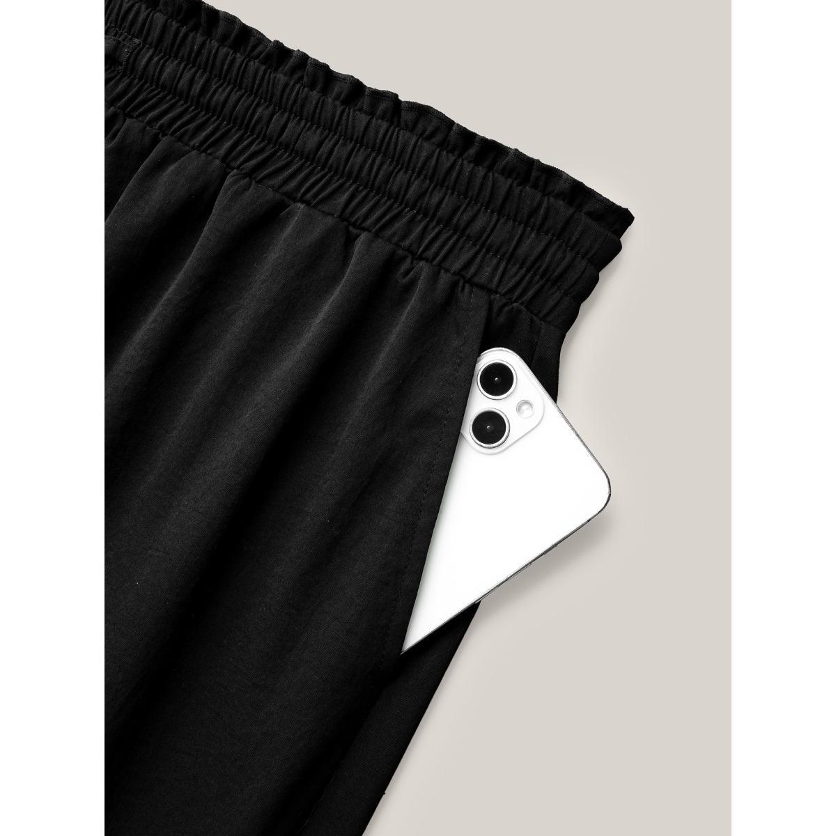 Plus Size Ruffled Waist Drawstring Tapered Pants Women Black Casual Mid Rise Everyday Pants BloomChic 22-24/3X Product Image