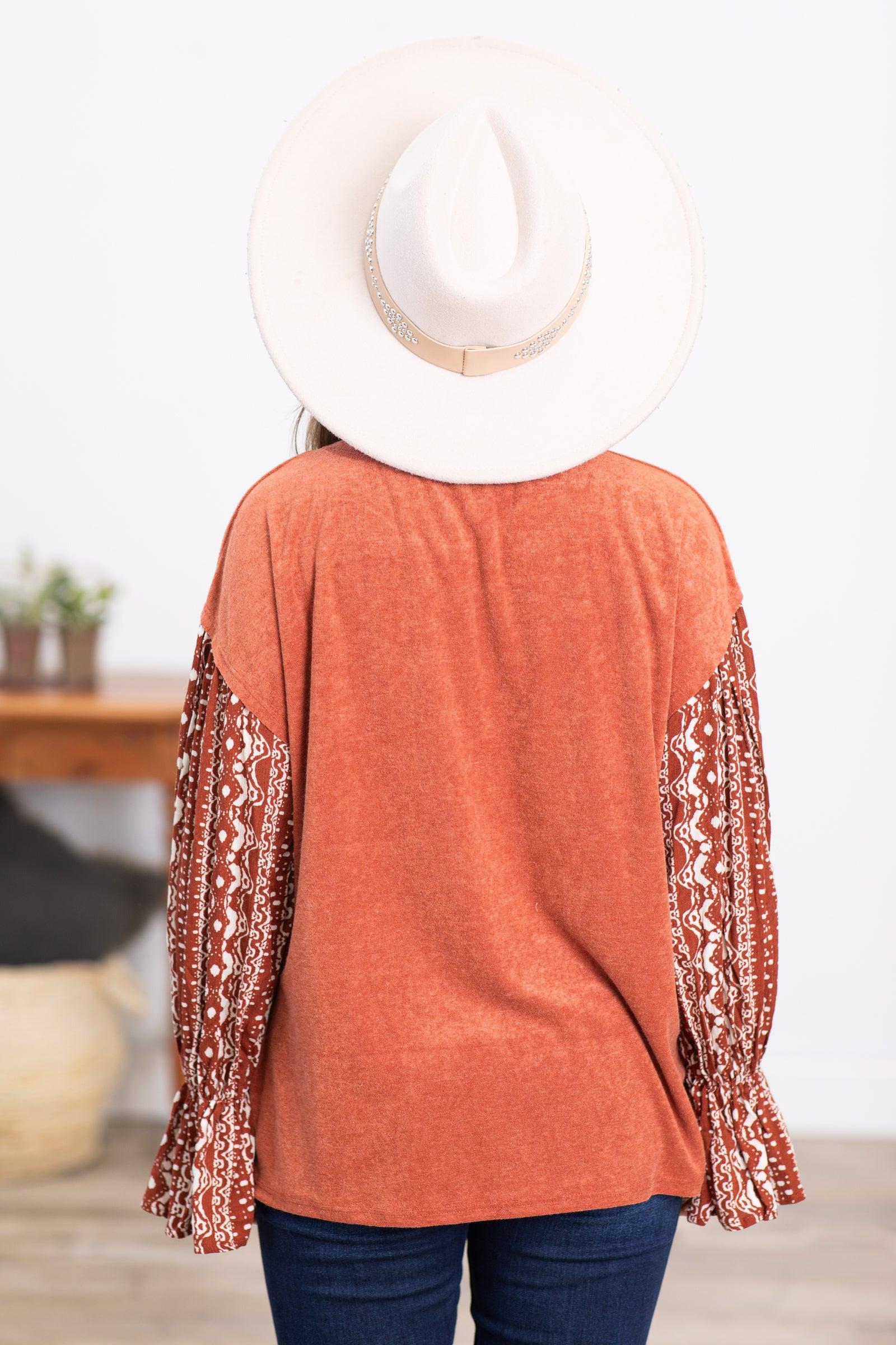 Rust Top With Aztec Print Balloon Sleeves Product Image