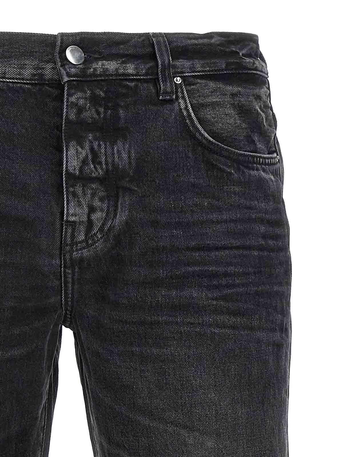AMIRI Release Hem Jeans In Black Product Image