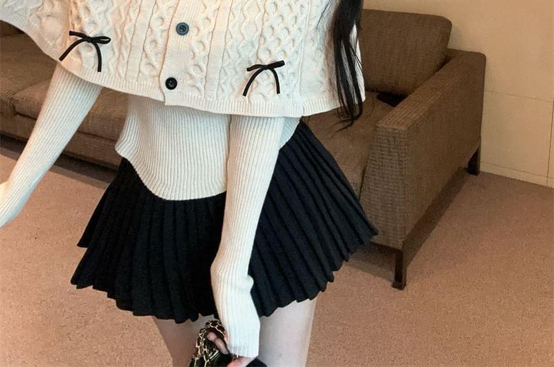 Set: Stand Collar Bow Cable Knit Button Capelet + Long Sleeve Ribbed Knit Top Product Image