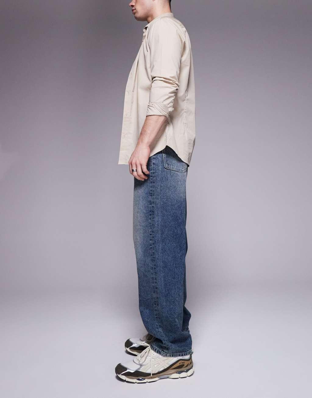 ASOS DESIGN baggy fit jeans in dark wash blue Product Image