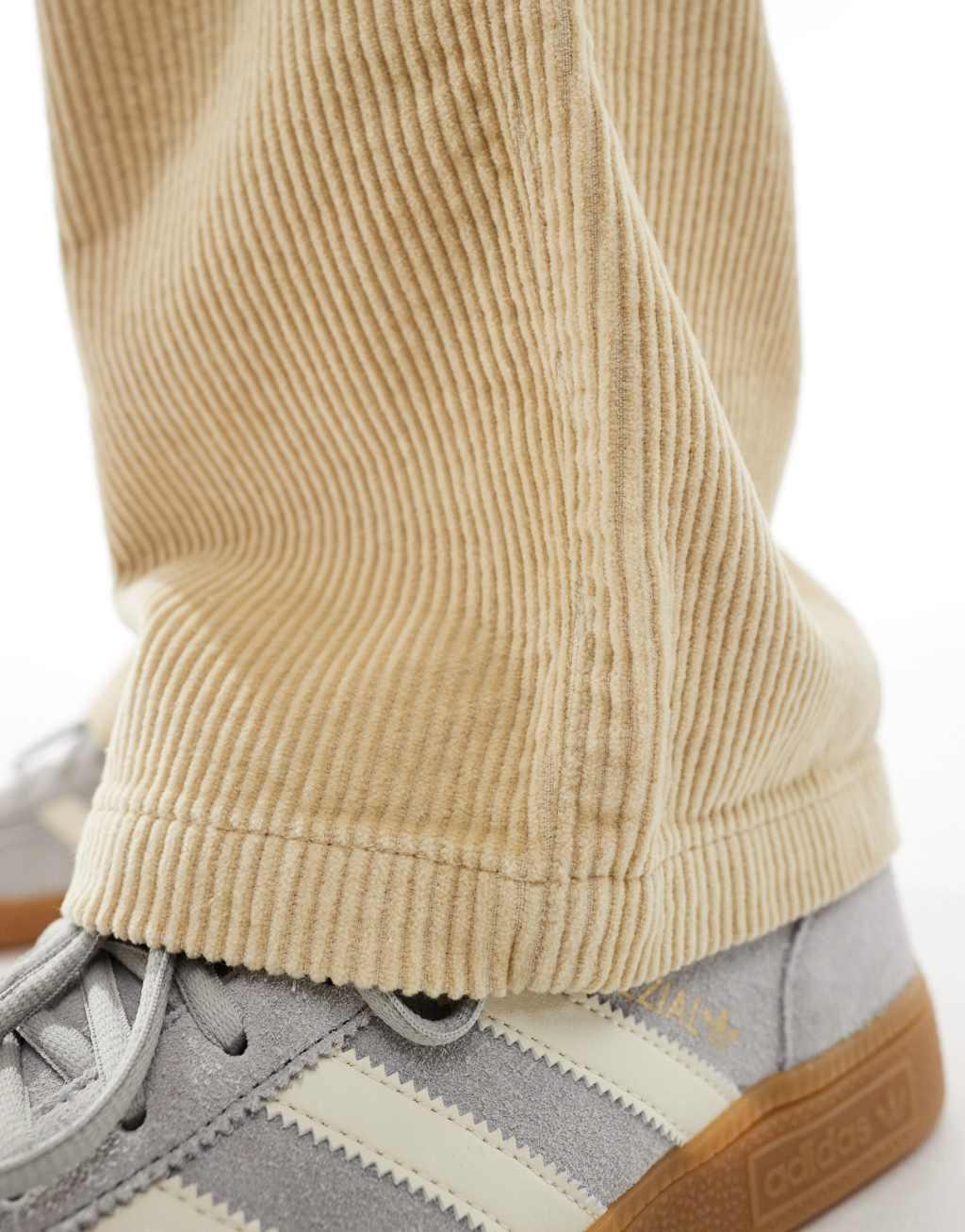 ASOS DESIGN baggy fit corduroy pants in stone Product Image