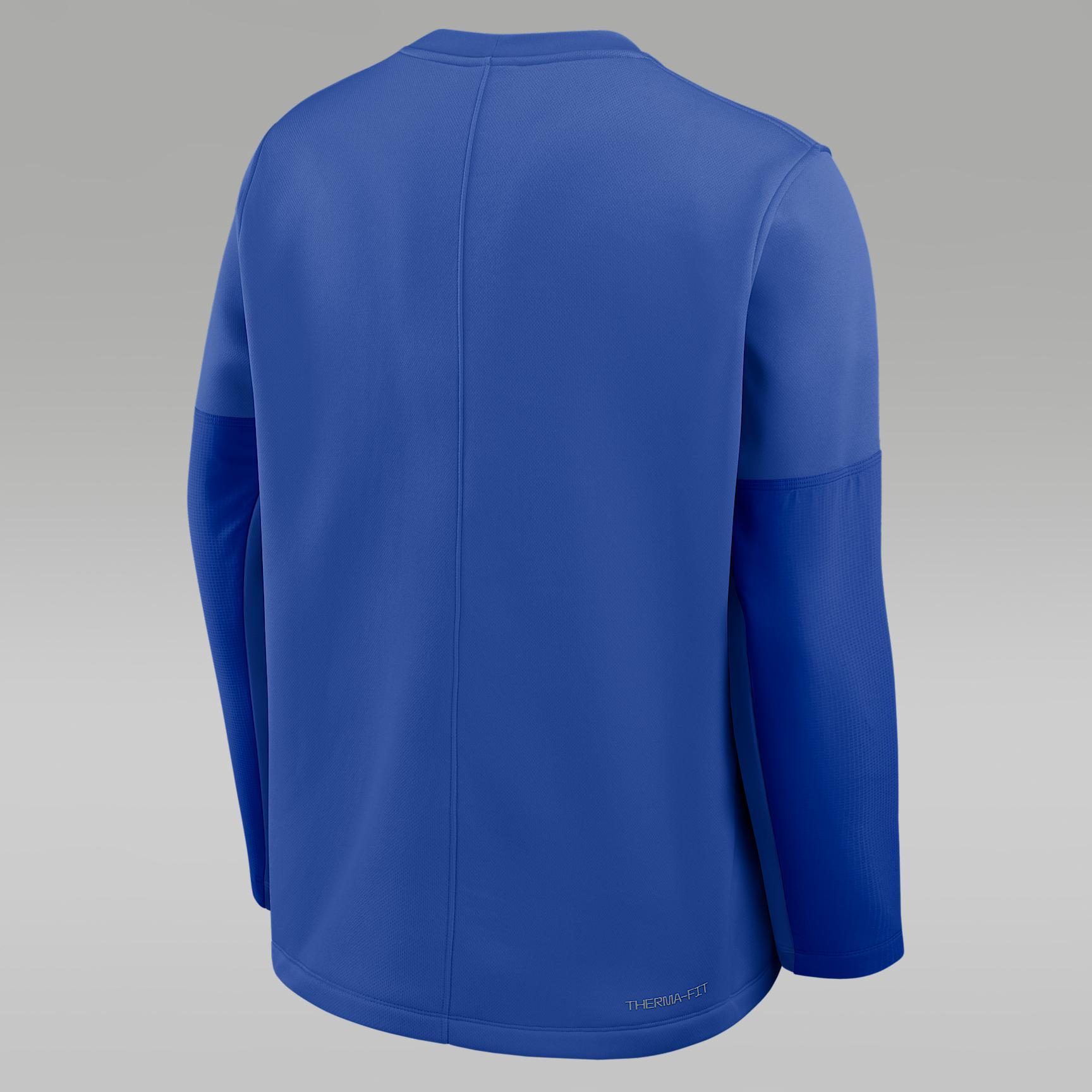 UCLA Sideline Coach Men's Jordan Brand Therma-FIT College Long-Sleeve T-Shirt Product Image