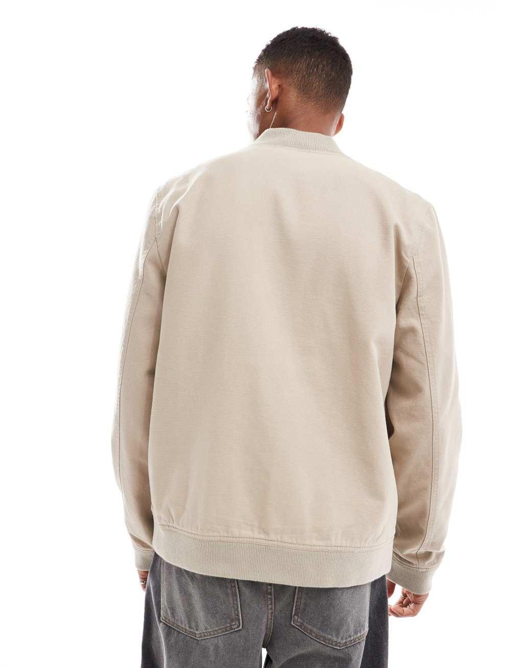 ASOS DESIGN washed bomber jacket in beige Product Image