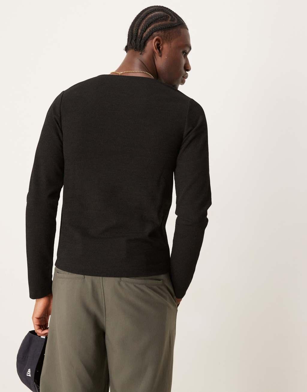 ASOS DESIGN muscle fit long sleeve boxy t-shirt with henley neck in black rib Product Image