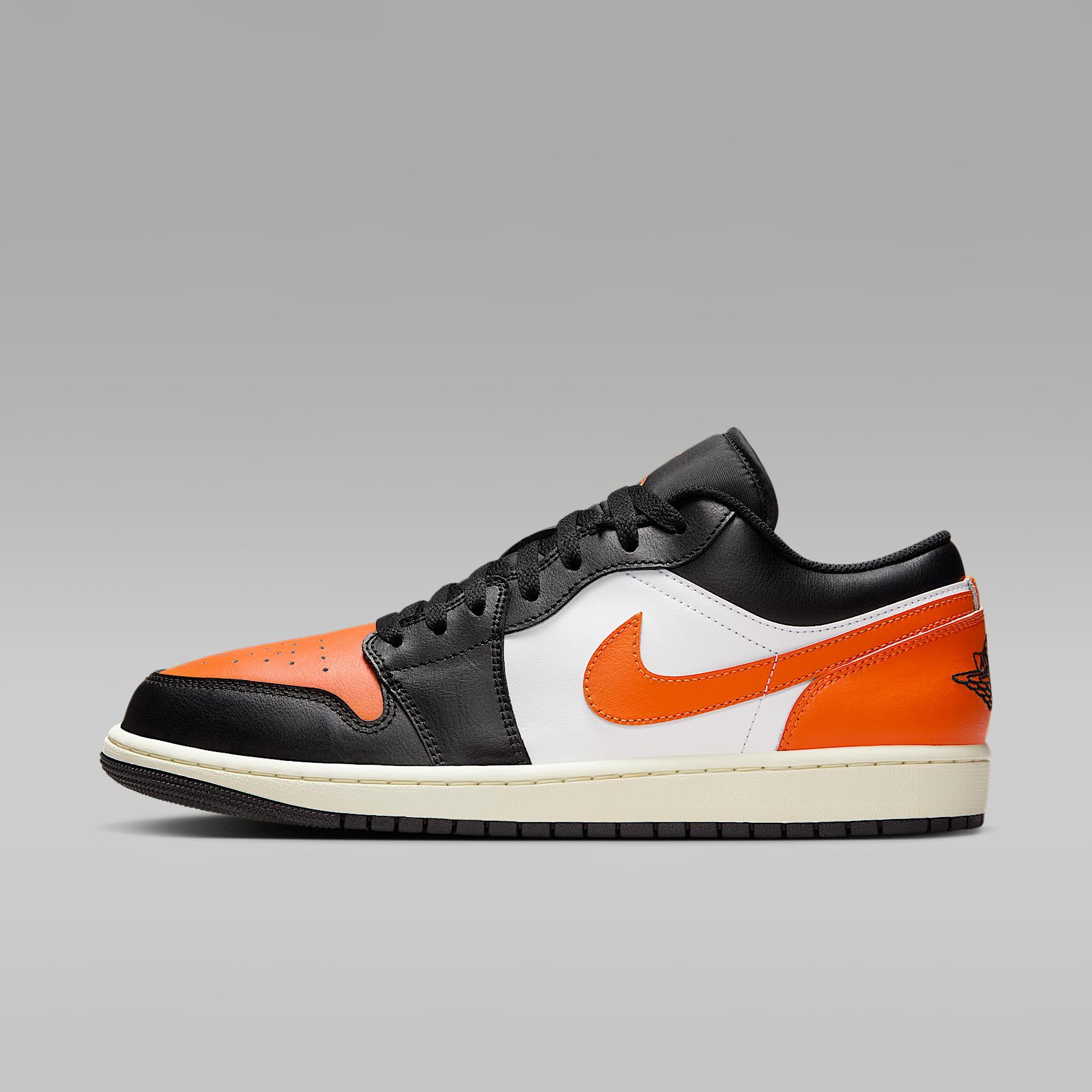 Jordan Mens Air Retro 1 Low Casual Shoes in Black/Starfish/White Product Image