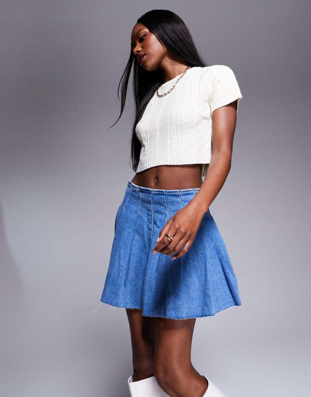River Island denim pleated mini skirt in lightwash blue Product Image