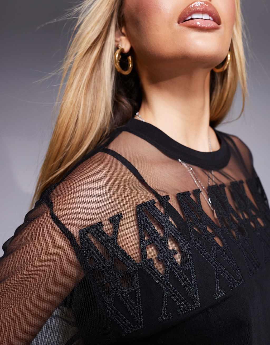 Armani Exchange mesh logo boxy T-shirt in black Product Image