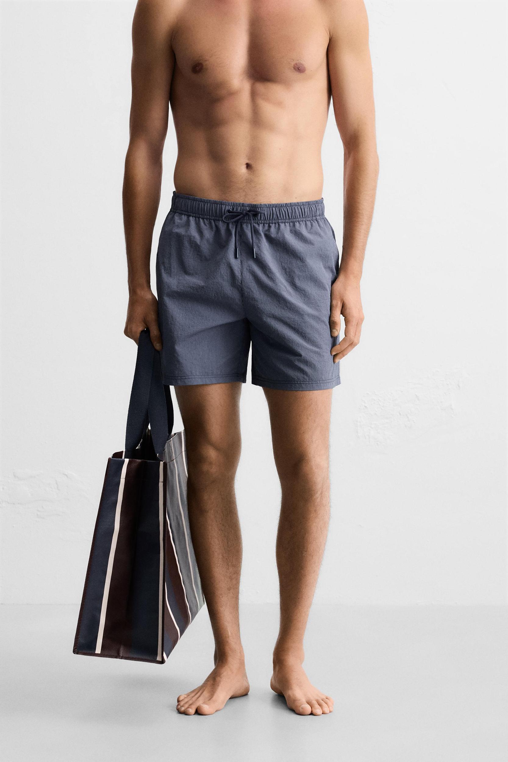 STRIPED MID-LENGTH SWIMSUIT Product Image