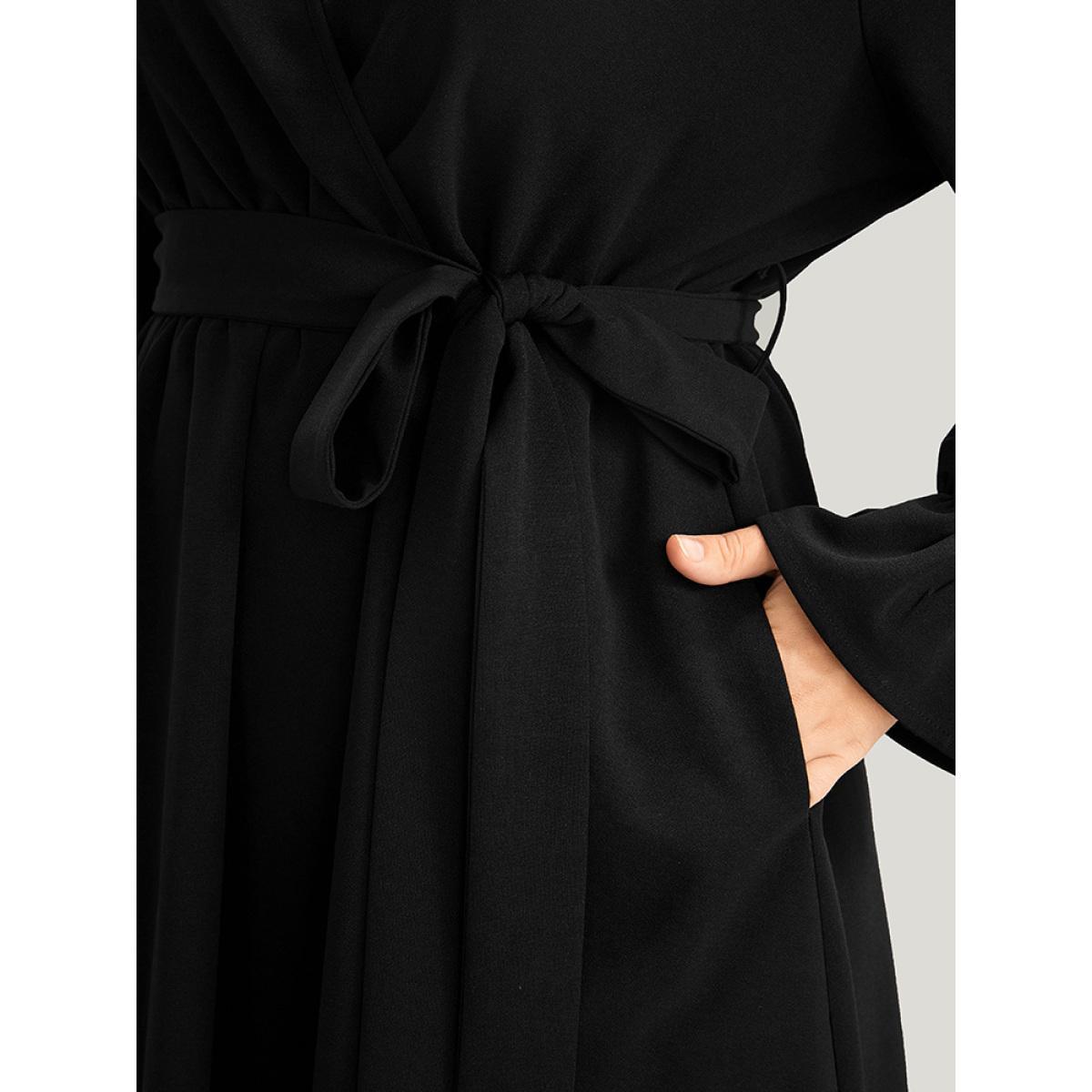 Plus Size Solid Wrap Pocket Belted Laser Cut Knee Dress Black Women Elegant Plain V-neck Long Sleeve Curvy Knee Dress BloomChic 26/4X Product Image