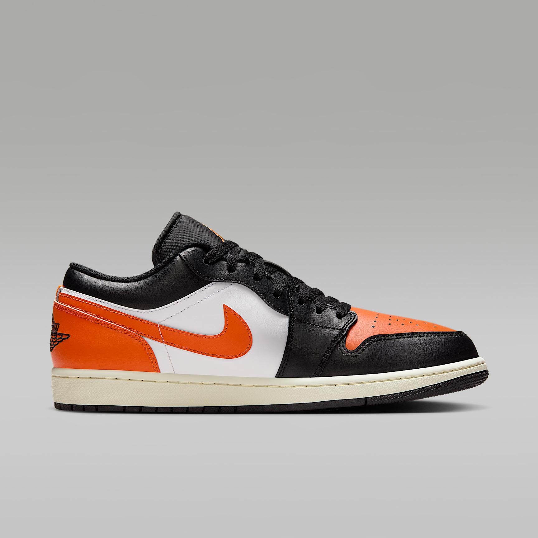 Jordan Mens Air Retro 1 Low Casual Shoes in Black/Starfish/White Product Image