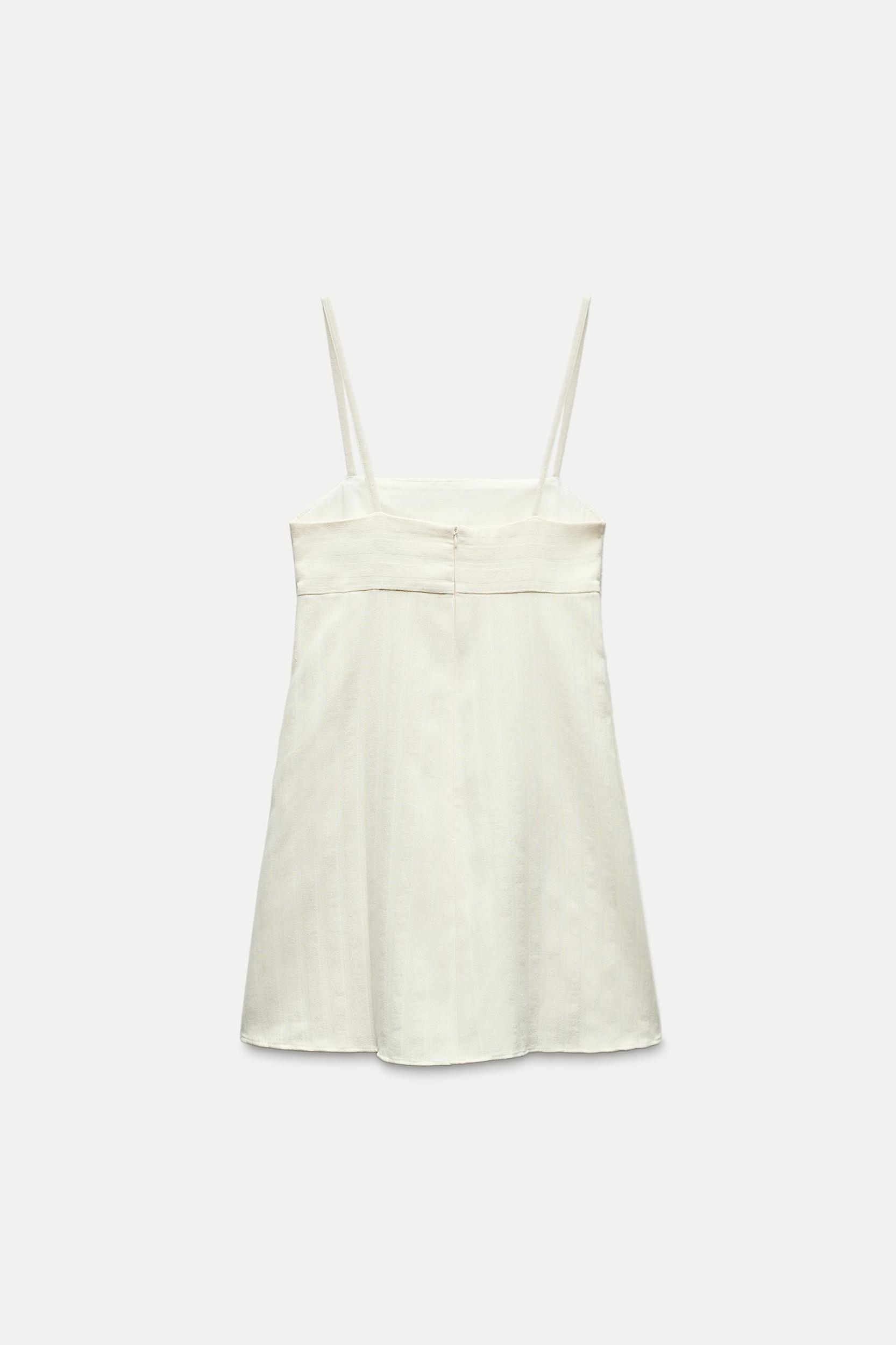 MINI DRESS WITH SIDE BUTTONS Product Image