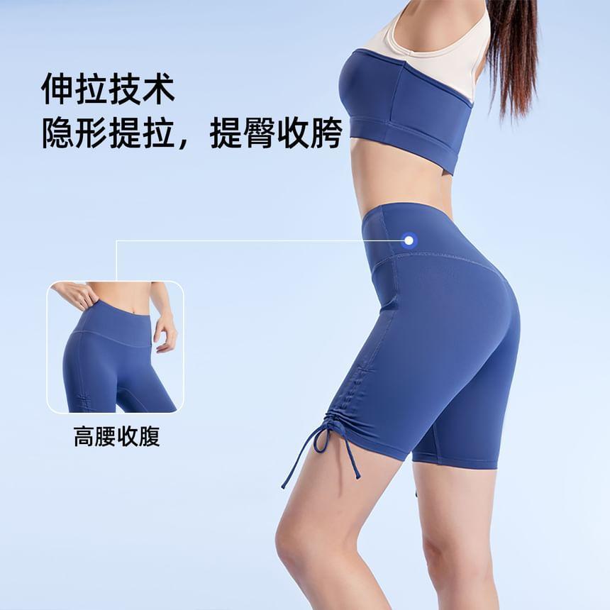 Set: Two Tone Sports Bra + High Waist Plain Drawstring Yoga Shorts Product Image