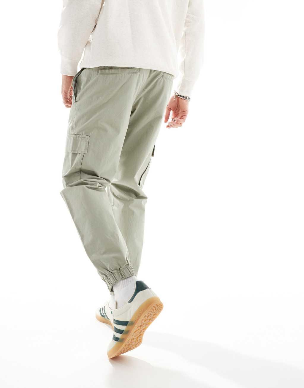 ASOS DESIGN tapered pull on pants in sage green Product Image