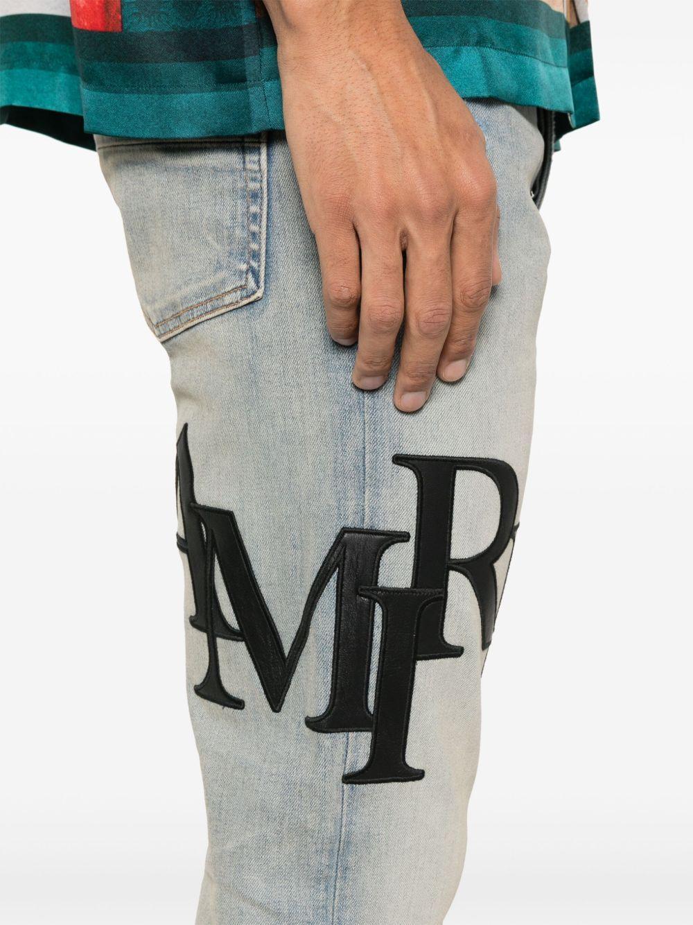 Staggered-logo jeans Product Image