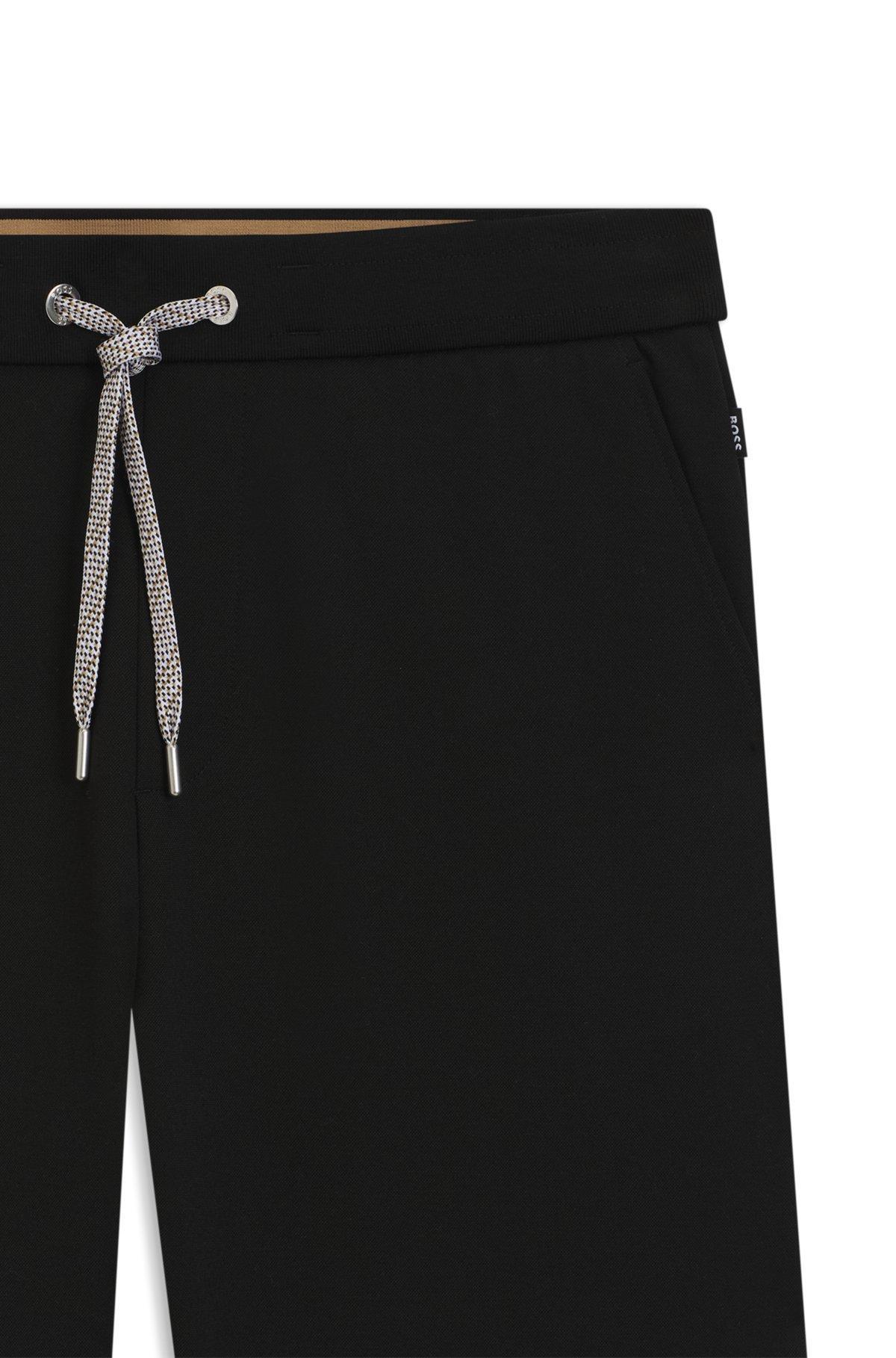 Tracksuit bottoms with patterned drawcord Product Image