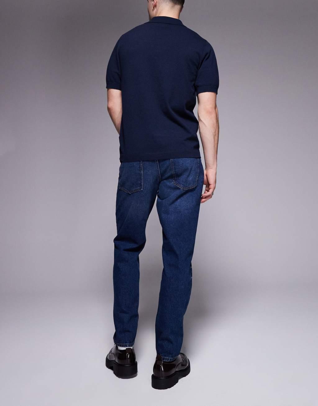 ASOS DESIGN tapered jeans in vintage dark wash blue Product Image