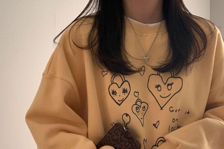 Heart Print Loose-Fit Sweatshirt Product Image