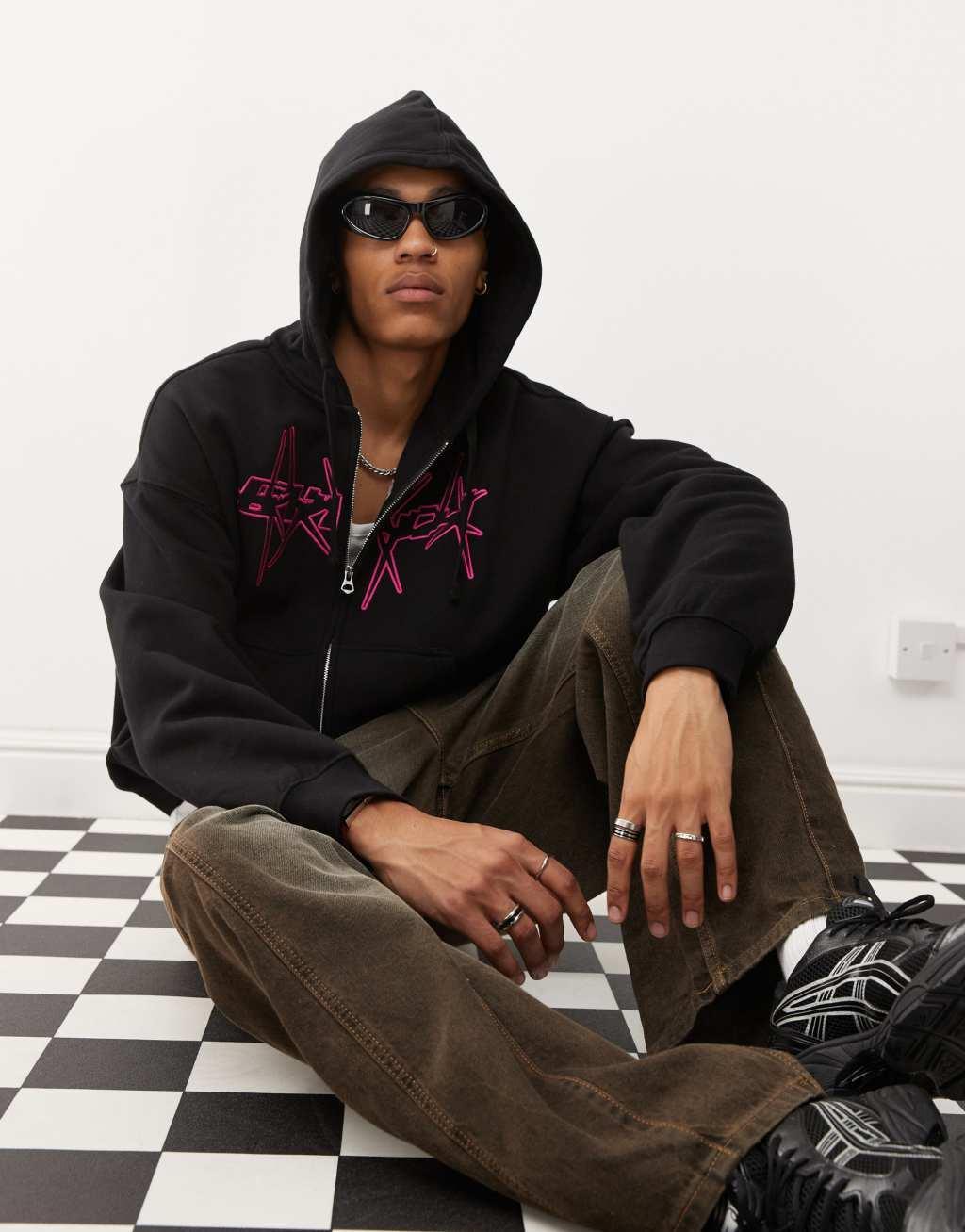 Weekday oversized zip through hoodie with spikey embroidered graphic in black Product Image
