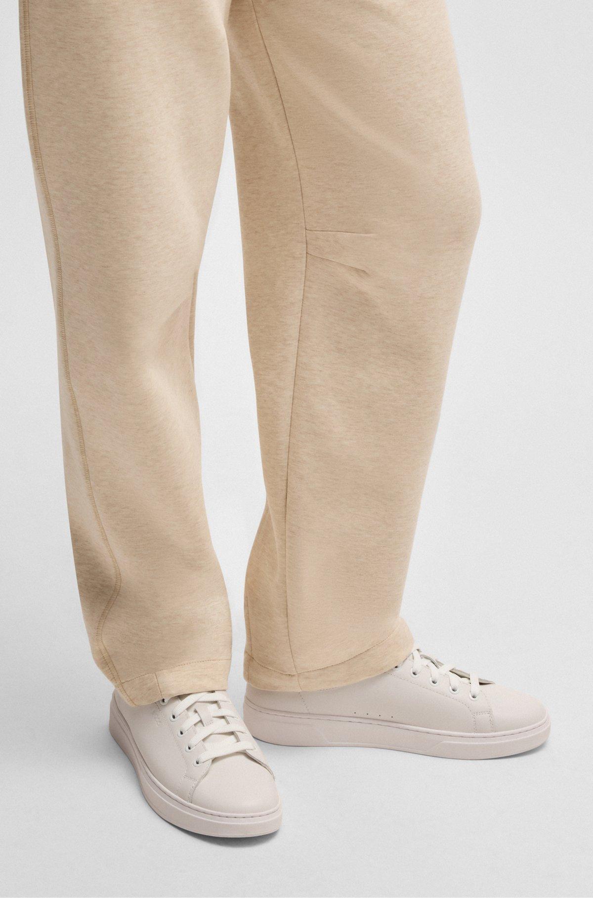 Leather trainers with suede backtab Product Image