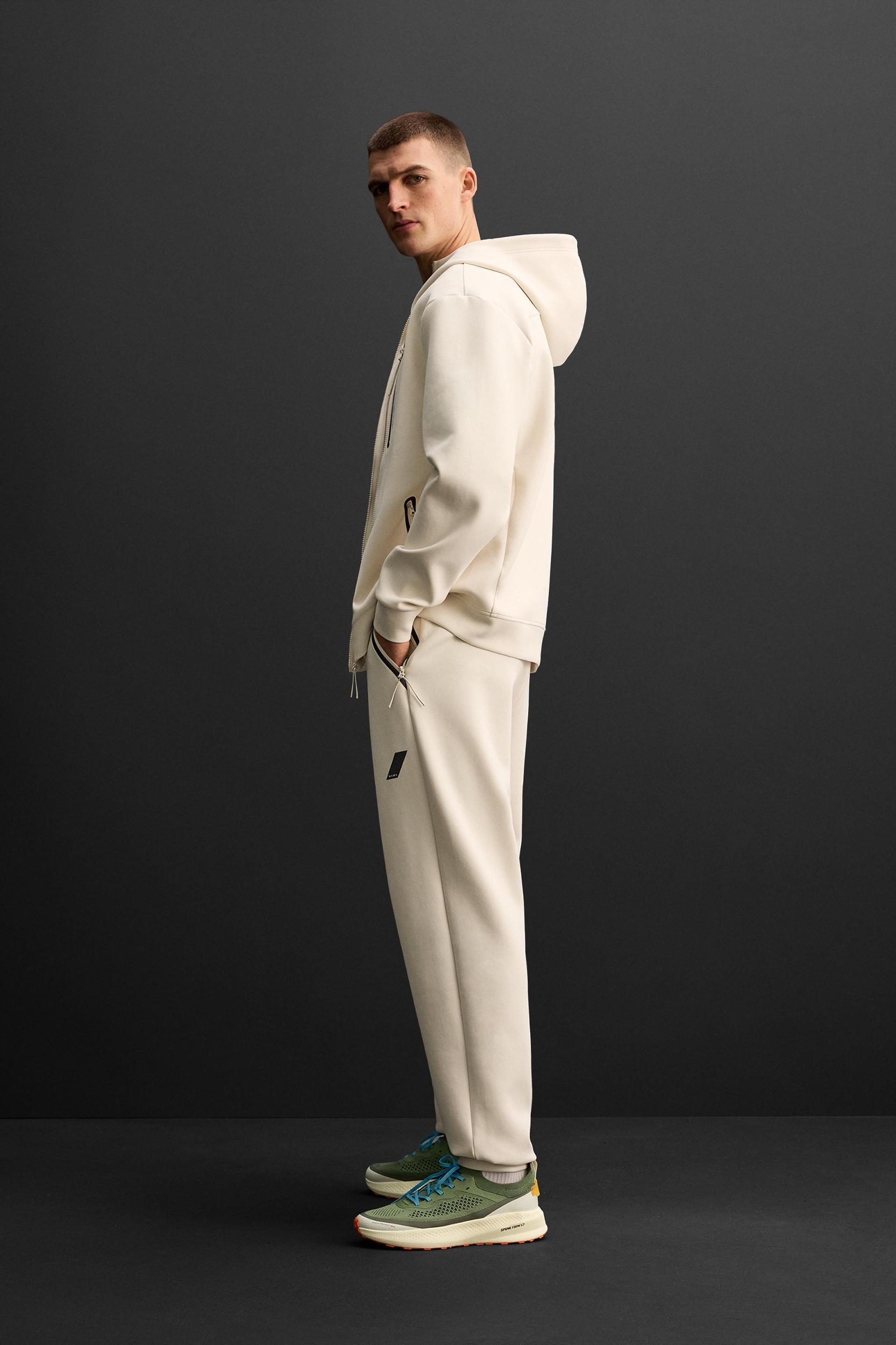 TECHNICAL ZIPPER JOGGER PANTS Product Image
