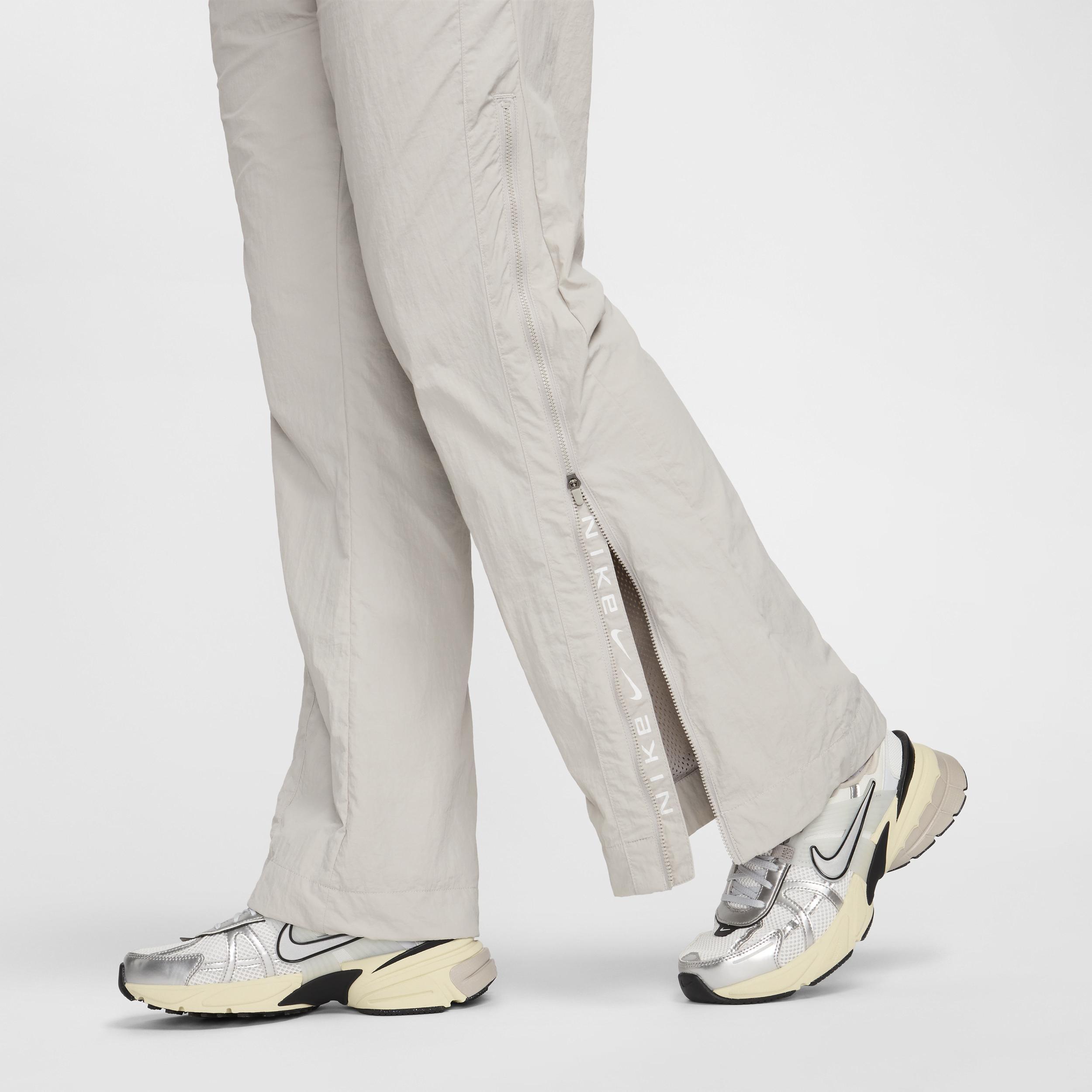 Nike Sportswear Collection Women's Mid-Rise Repel Zip Pants Product Image