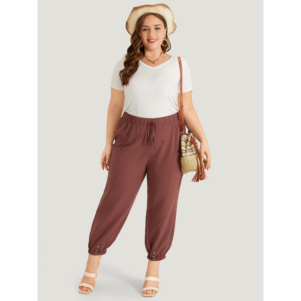 Plus Size Solid Patched Pocket Bowknot Button Detail Pants Women Rust Casual High Rise Dailywear Pants BloomChic 26/4X Product Image