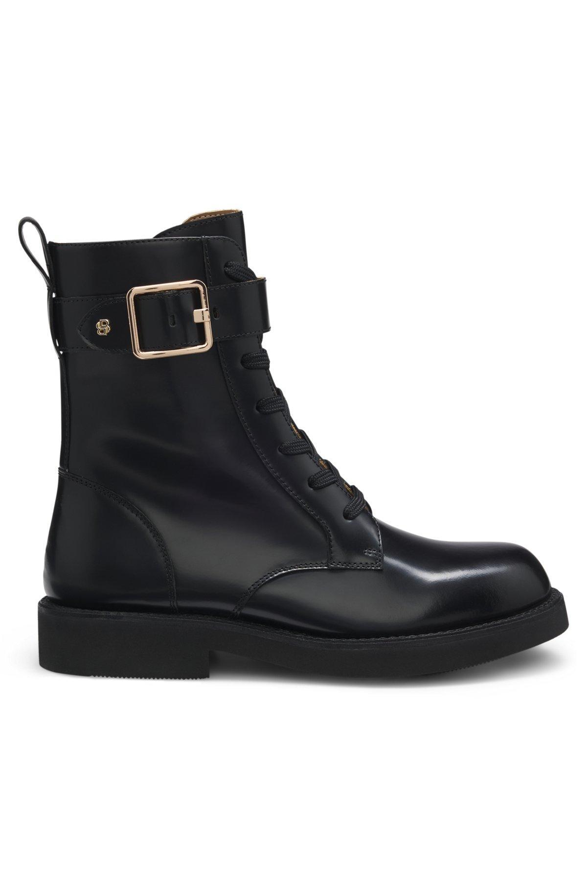 Leather boots with buckle detail Product Image