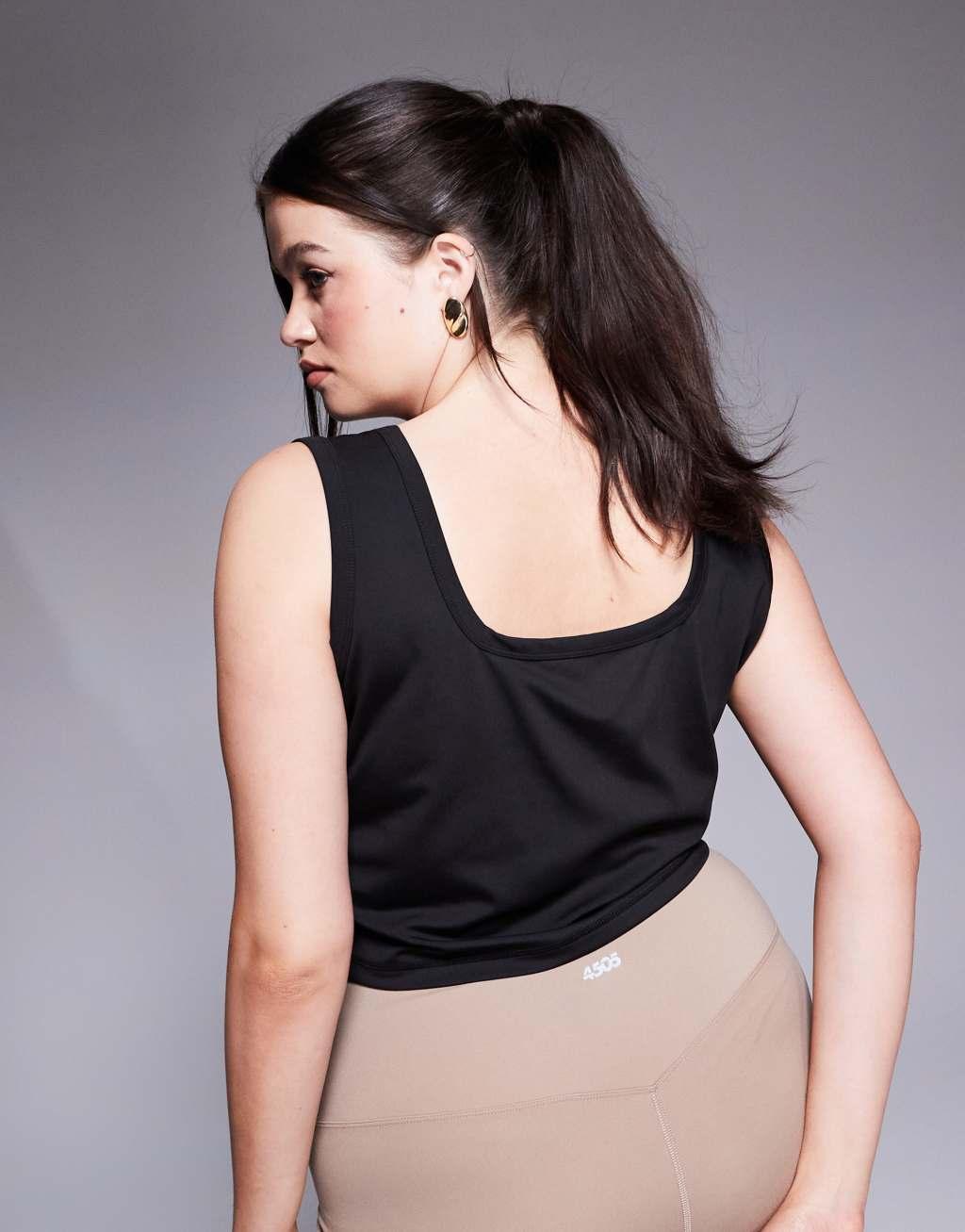 ASOS 4505 Curve scoop neck slightly cropped training tank top in black Product Image