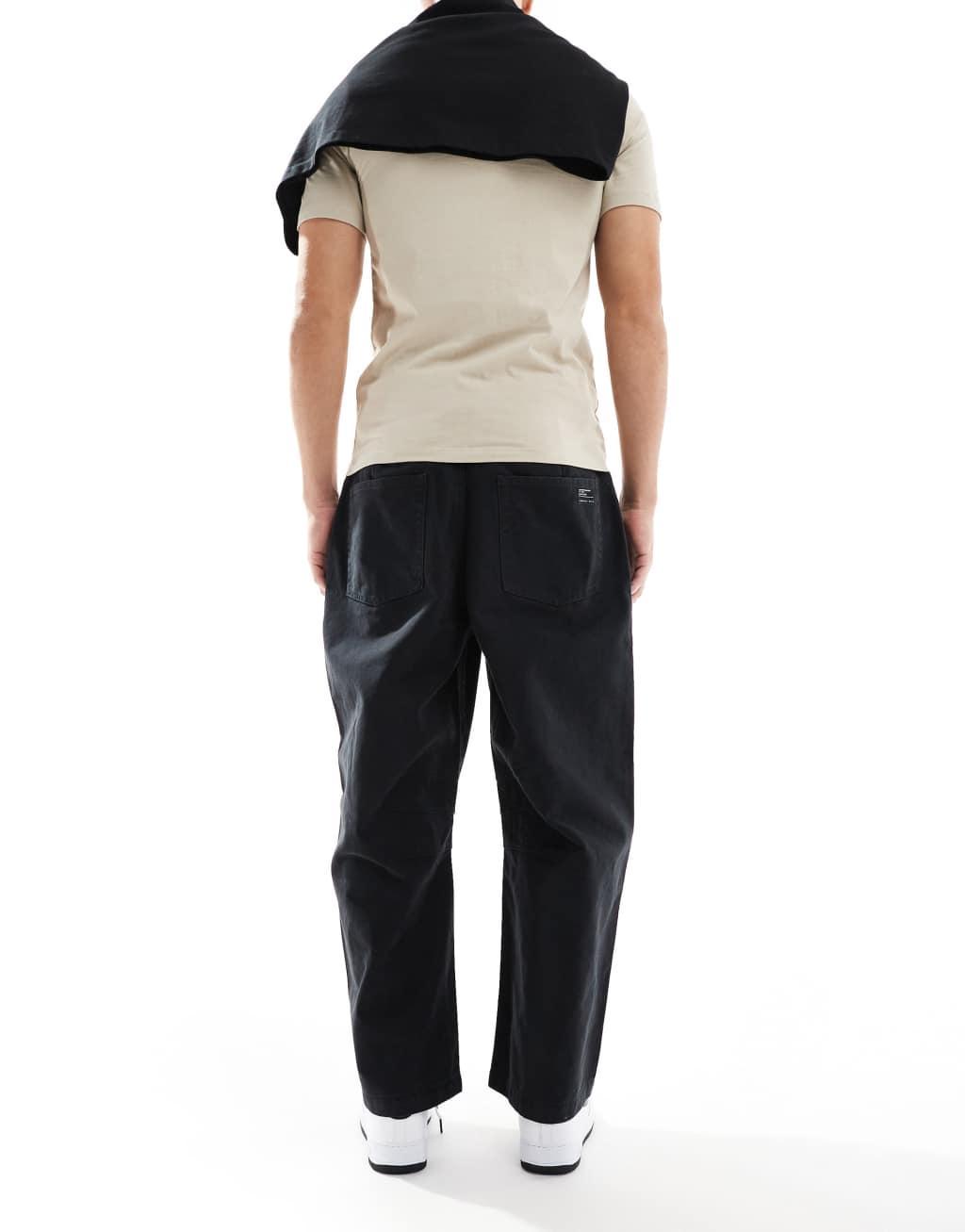 ASOS DESIGN horseshoe jeans in black Product Image